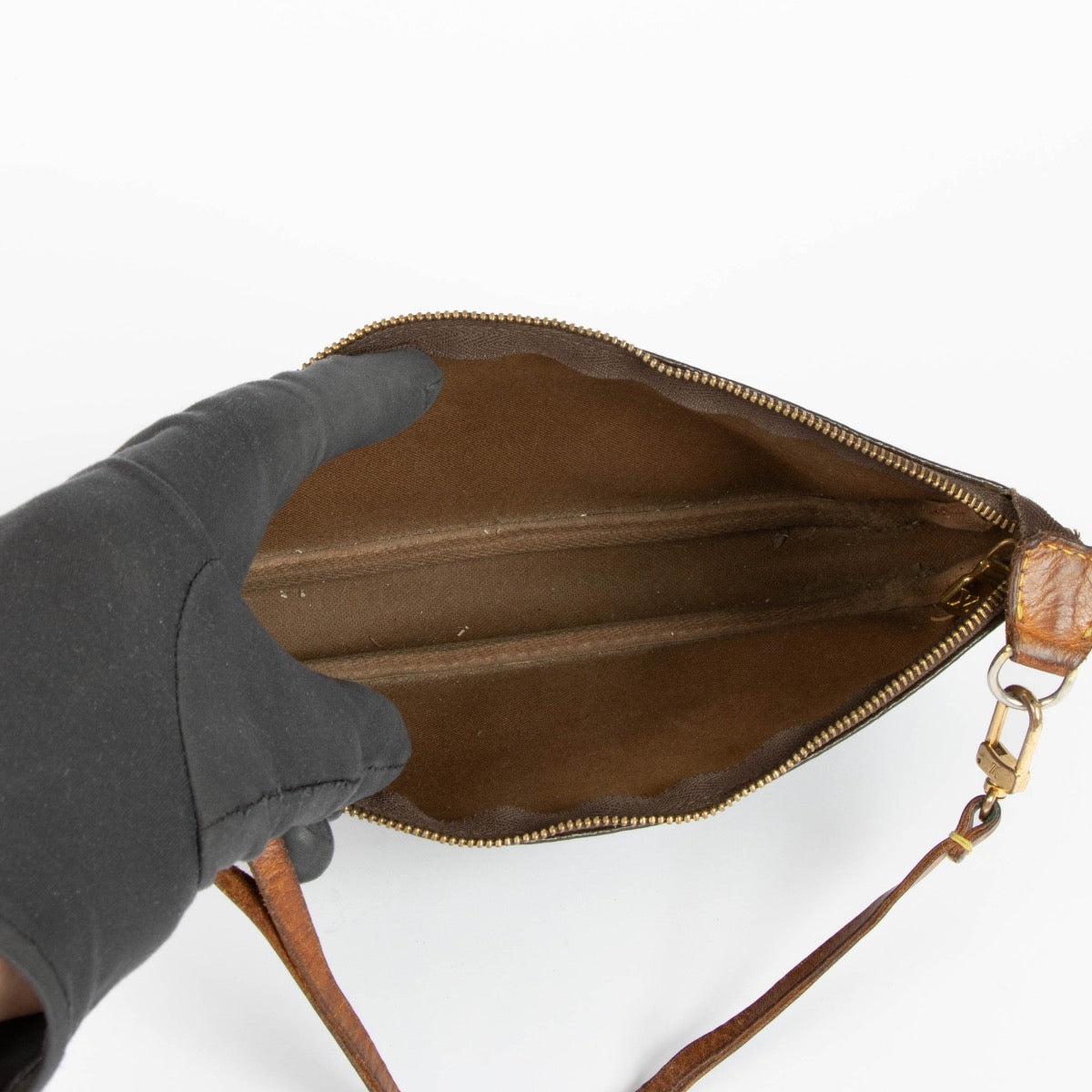 Authentic pre-loved Louis Vuitton Monogram Pochette Accessoires Clutch on Labellov.com