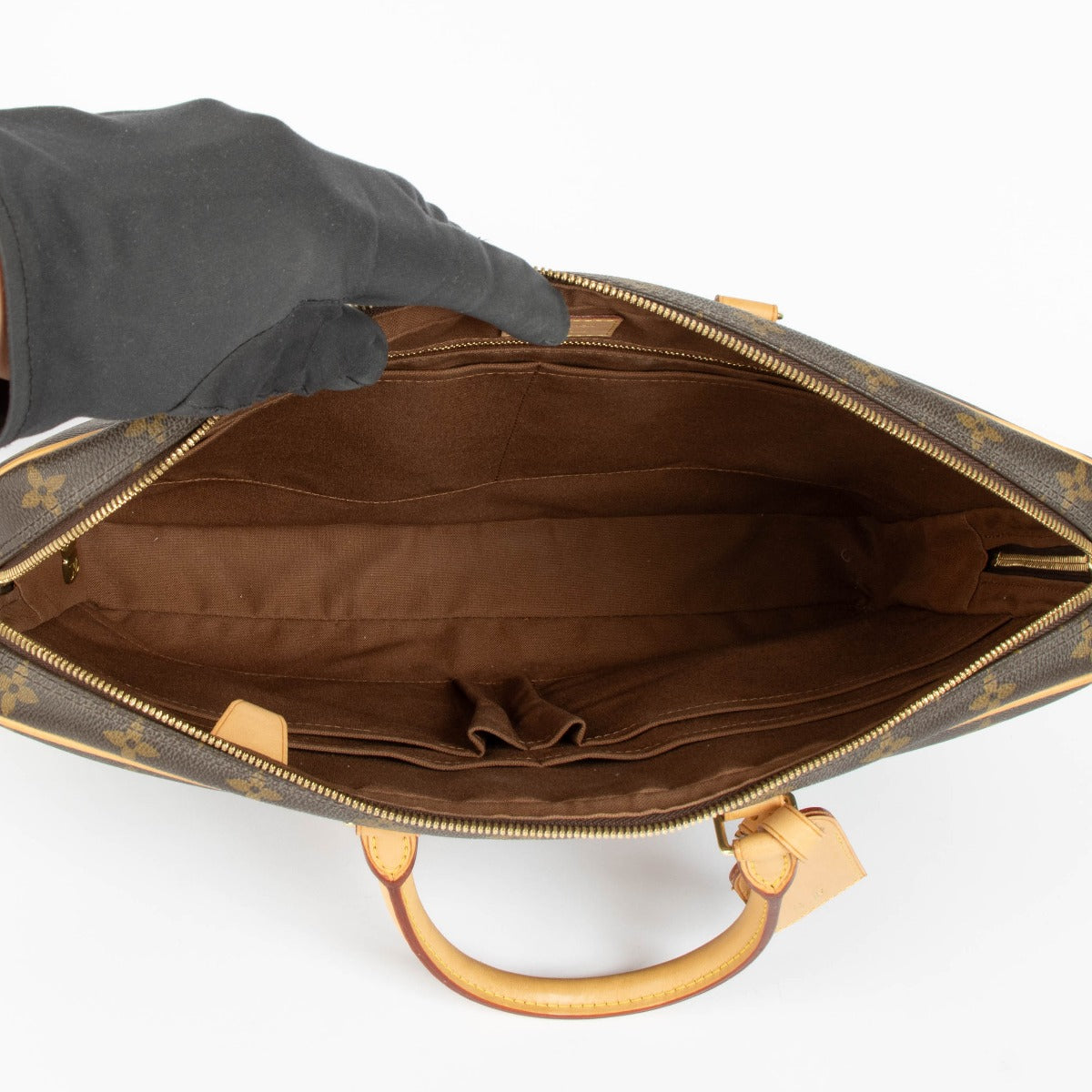 Shop this authentic Louis Vuitton Monogram Porte-Document Voyage PM pre-loved on Labellov.com