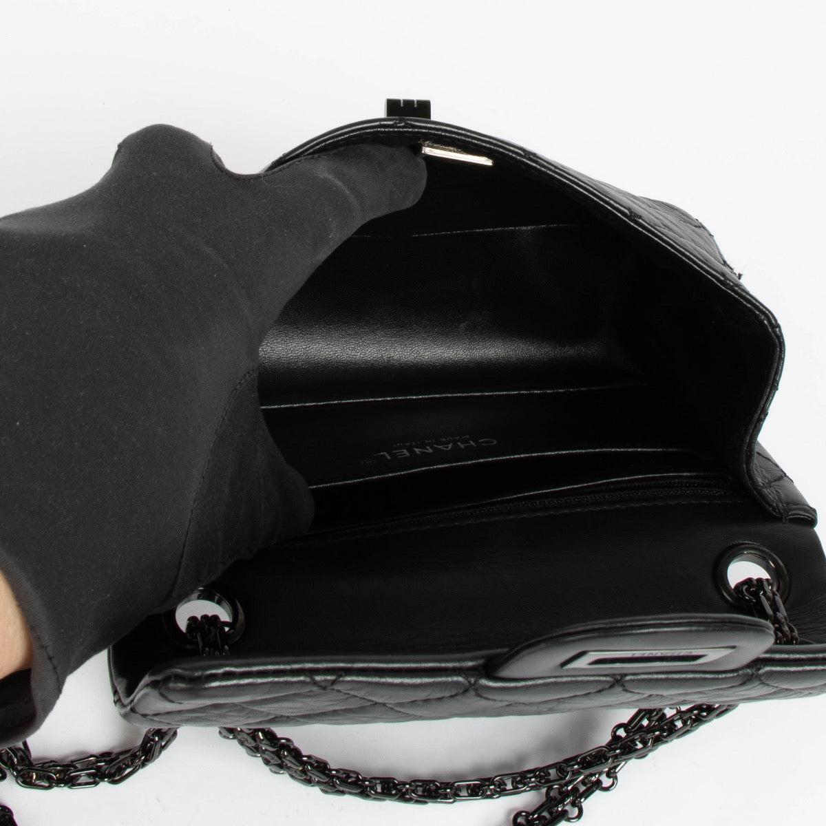 Authentic pre-loved Chanel So Black Calfskin Mini 2.55 Reissue Bag on Labellov.com