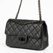 Authentic pre-loved Chanel So Black Calfskin Mini 2.55 Reissue Bag on Labellov.com