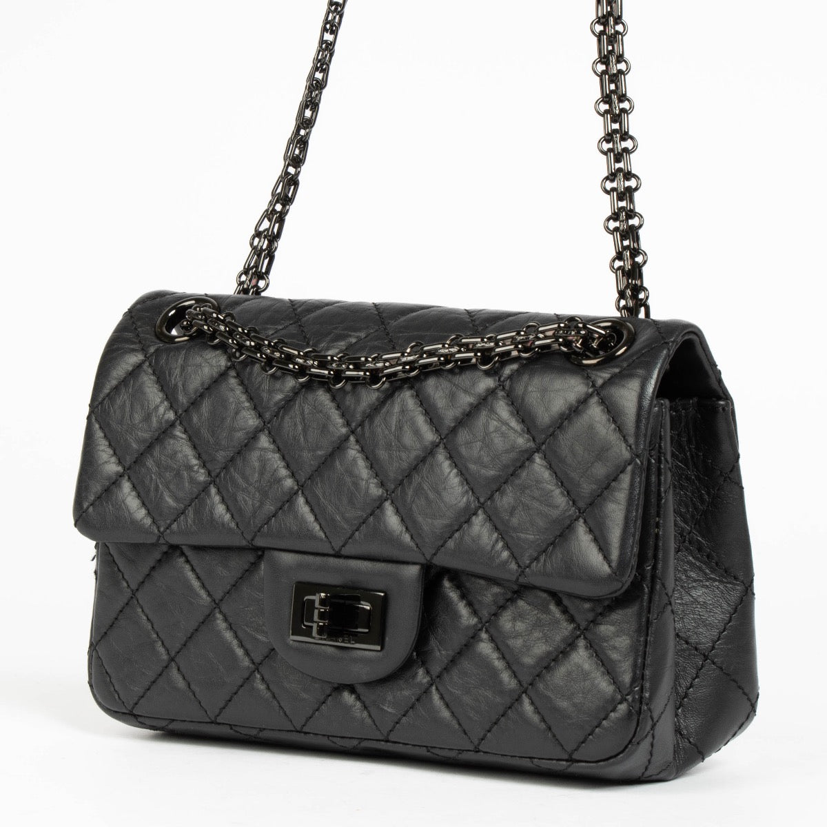 Authentic pre-loved Chanel So Black Calfskin Mini 2.55 Reissue Bag on Labellov.com