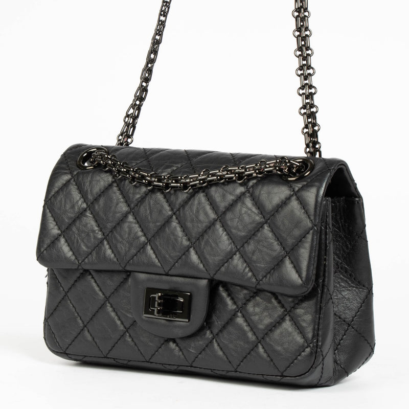 Authentic pre-loved Chanel So Black Calfskin Mini 2.55 Reissue Bag on Labellov.com