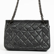 Authentic pre-loved Chanel So Black Calfskin Mini 2.55 Reissue Bag on Labellov.com
