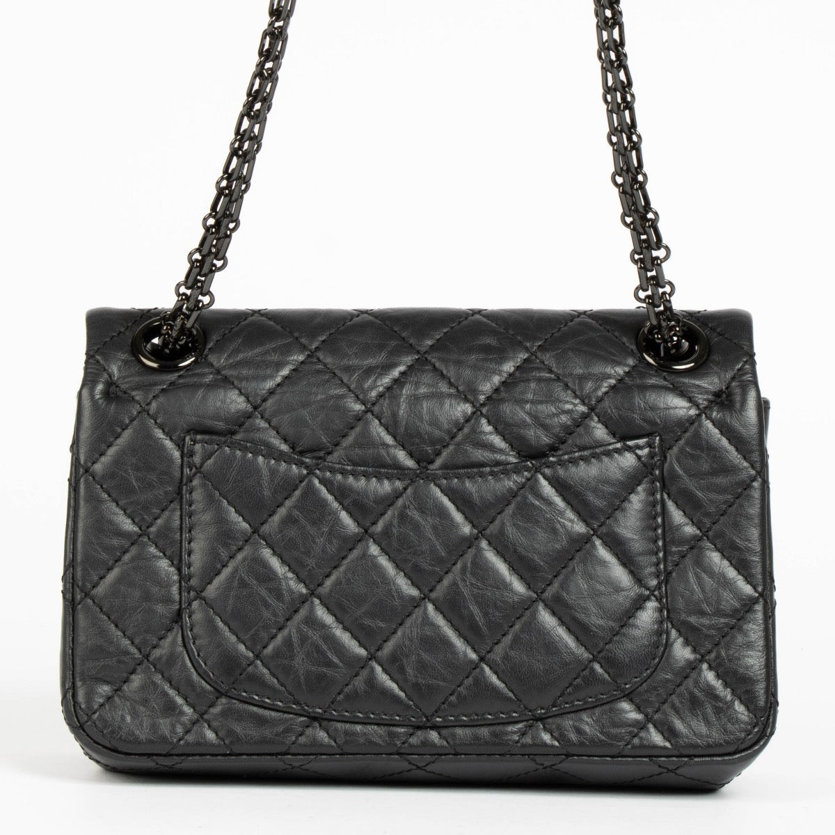 Authentic pre-loved Chanel So Black Calfskin Mini 2.55 Reissue Bag on Labellov.com