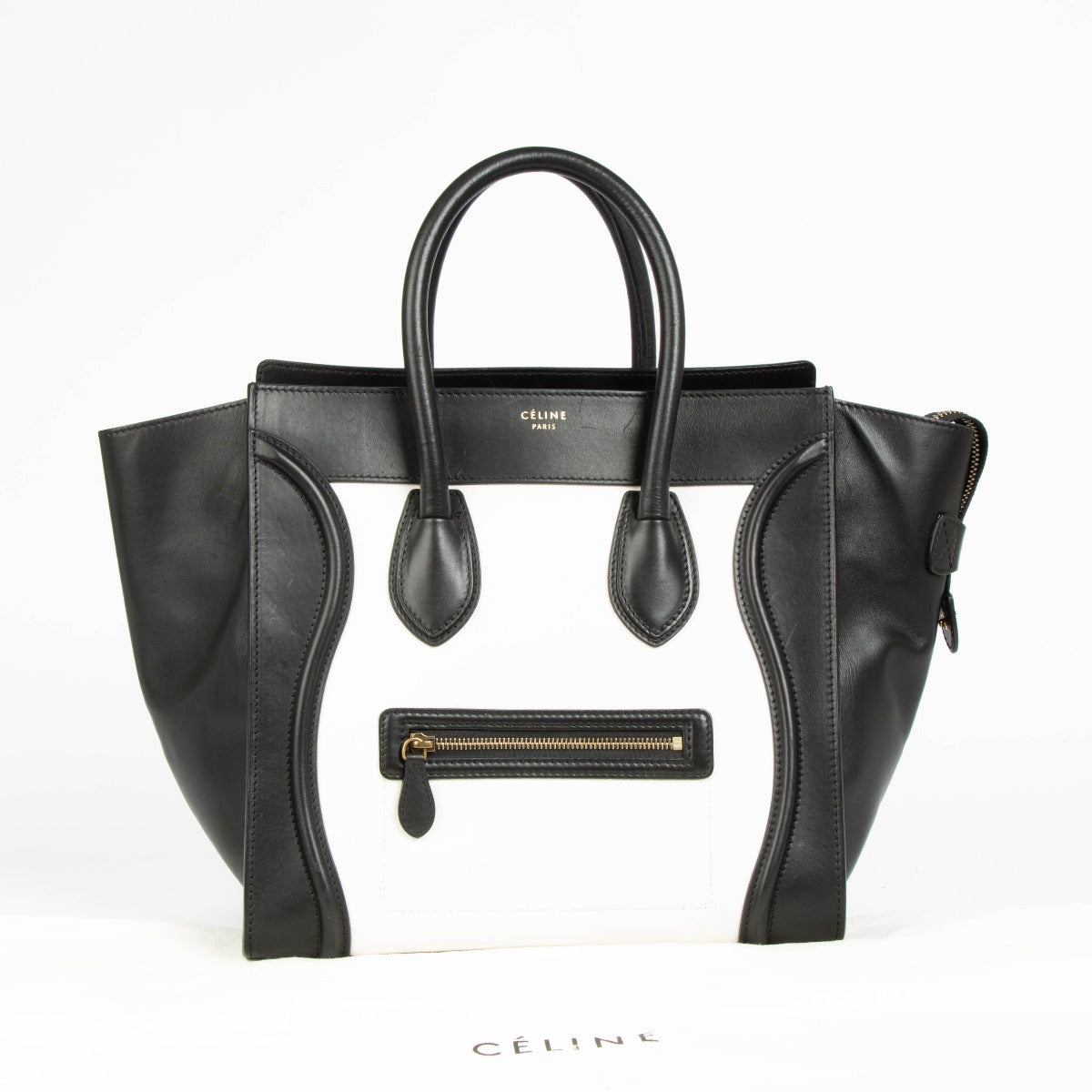 Authentic pre-loved Celine Bi-Color Leather Mini Luggage Bag on Labellov.com