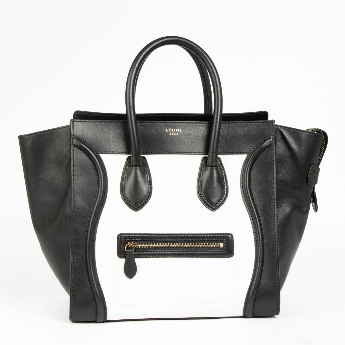 Authentic pre-loved Celine Bi-Color Leather Mini Luggage Bag on Labellov.com