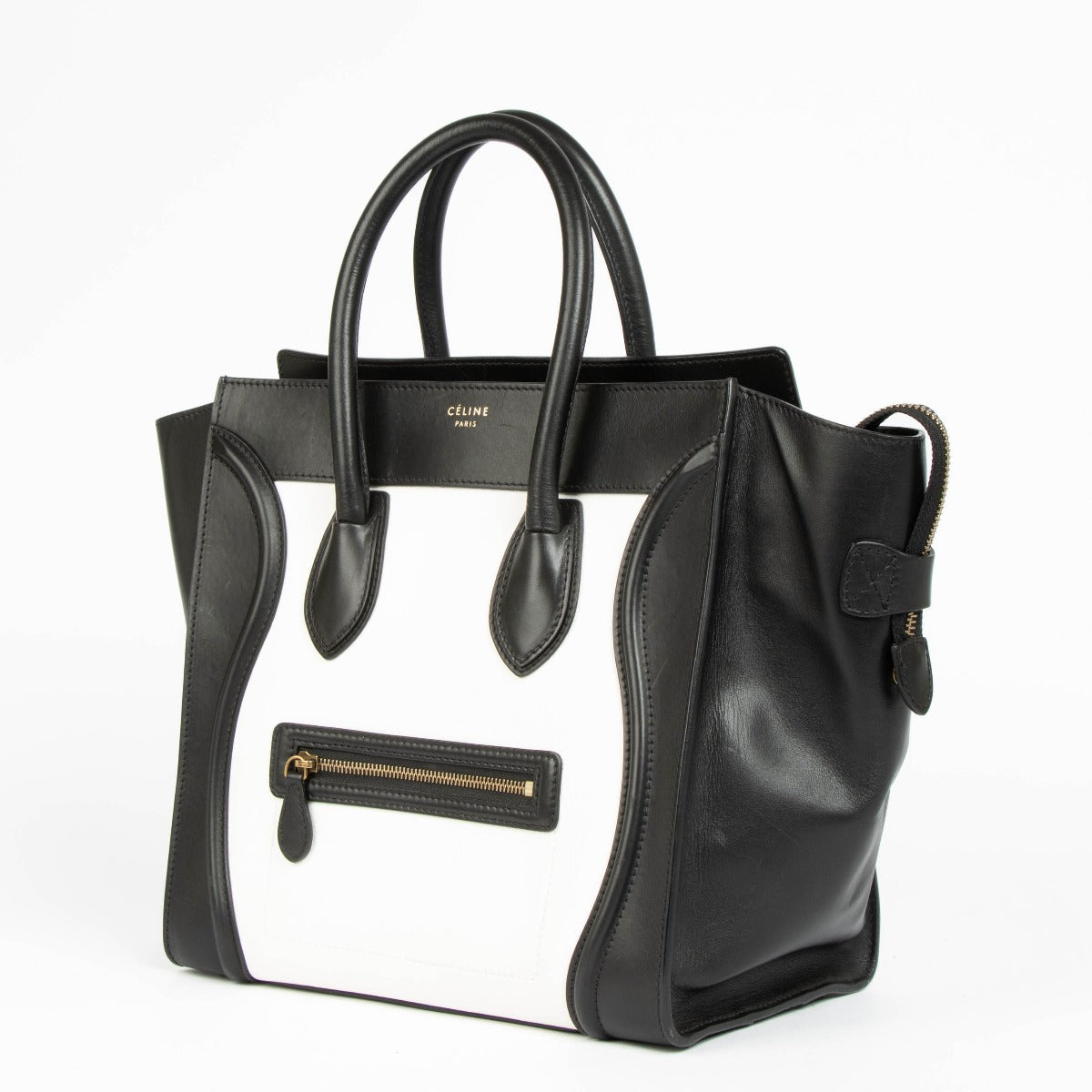 Authentic pre-loved Celine Bi-Color Leather Mini Luggage Bag on Labellov.com