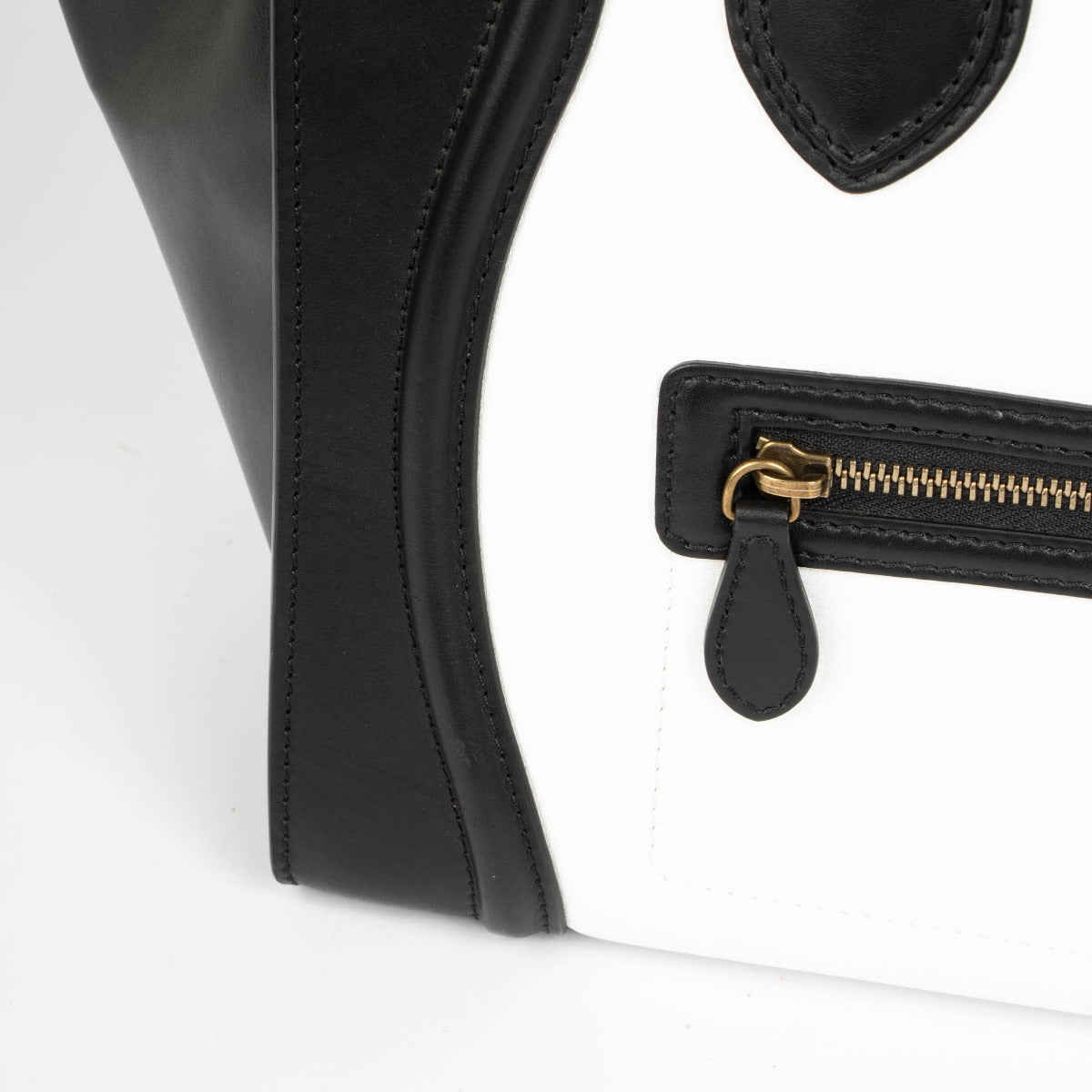 Authentic pre-loved Celine Bi-Color Leather Mini Luggage Bag on Labellov.com