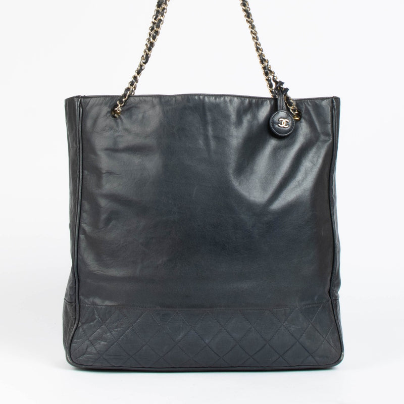 Authentic pre-loved Chanel Dark Blue Leather Vintage Tote Bag on Labellov.com