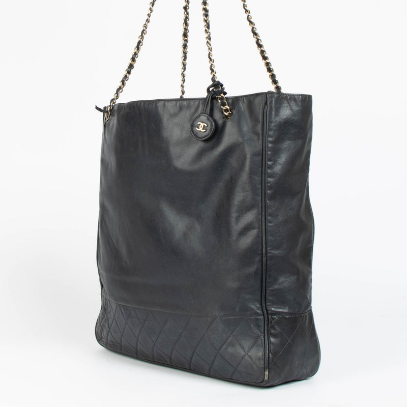 Authentic pre-loved Chanel Dark Blue Leather Vintage Tote Bag on Labellov.com