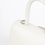 Authentic pre-loved Delvaux Ivory Box Calf Brillant Mini Bag on Labellov.com