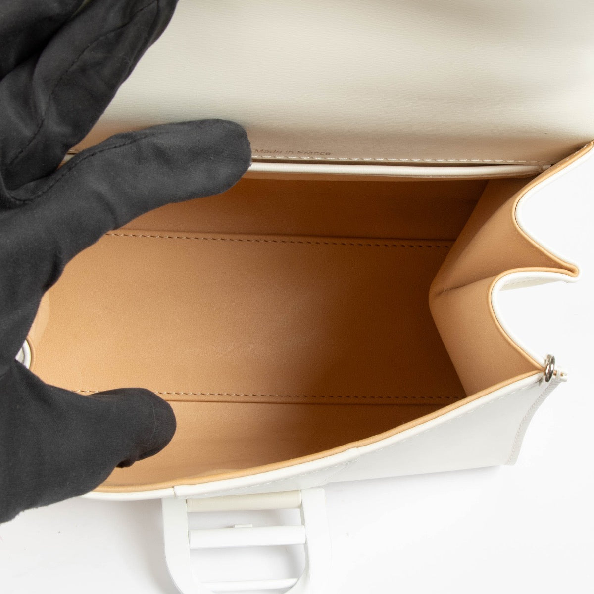 Authentic pre-loved Delvaux Ivory Box Calf Brillant Mini Bag on Labellov.com