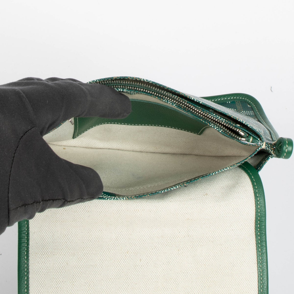 Shop this 100% authentic Goyard Green Goyardine Pochette Plume Bag at Labellov.com