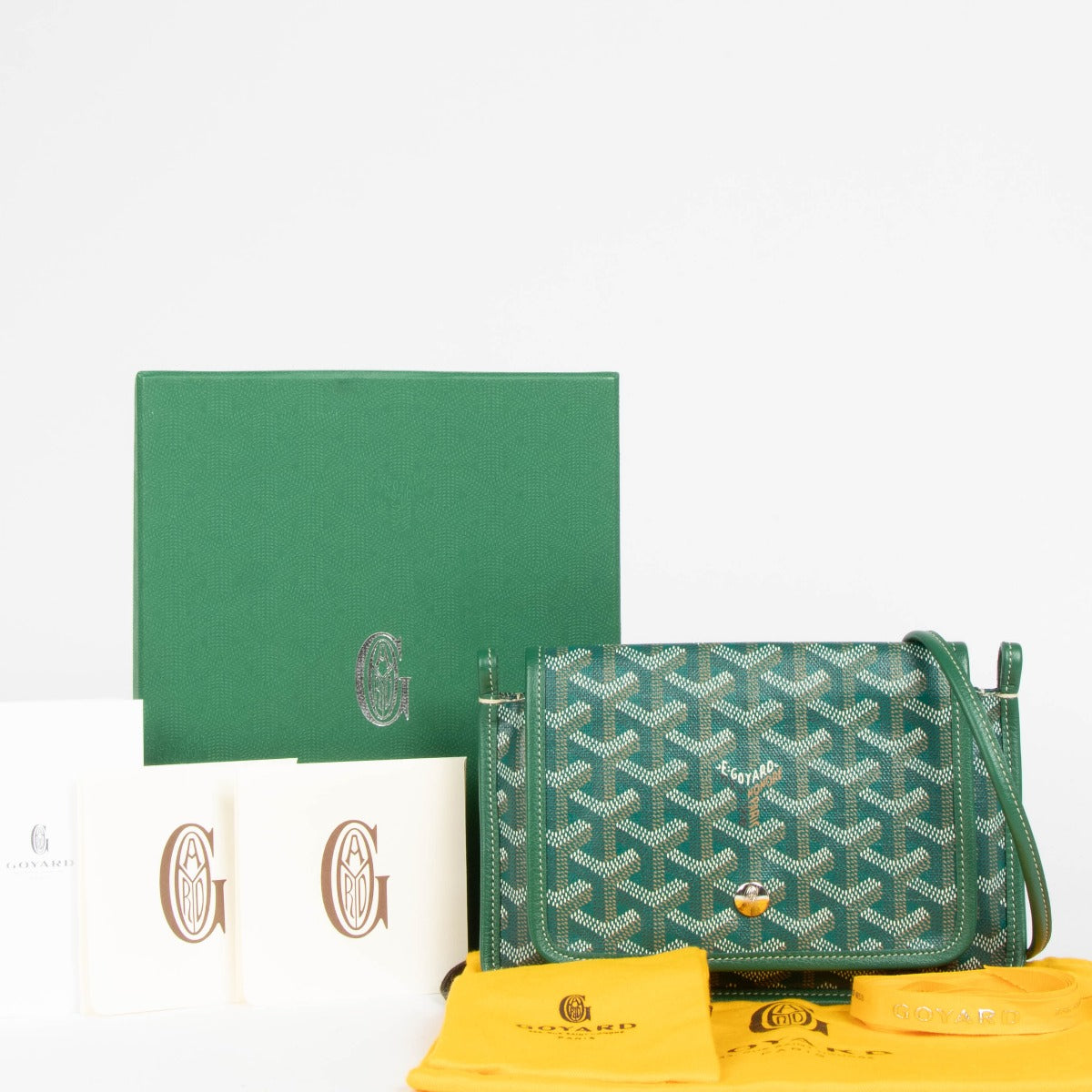 Shop this 100% authentic Goyard Green Goyardine Pochette Plume Bag at Labellov.com
