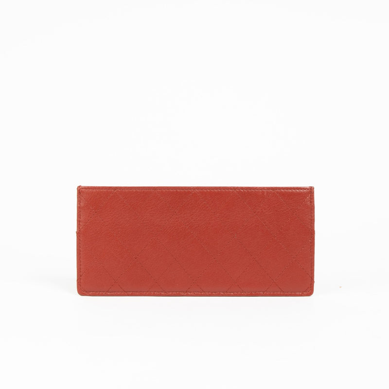 Authentic pre-loved Chanel Vintage Red Quilted Leather Card Holder on Labellov.com