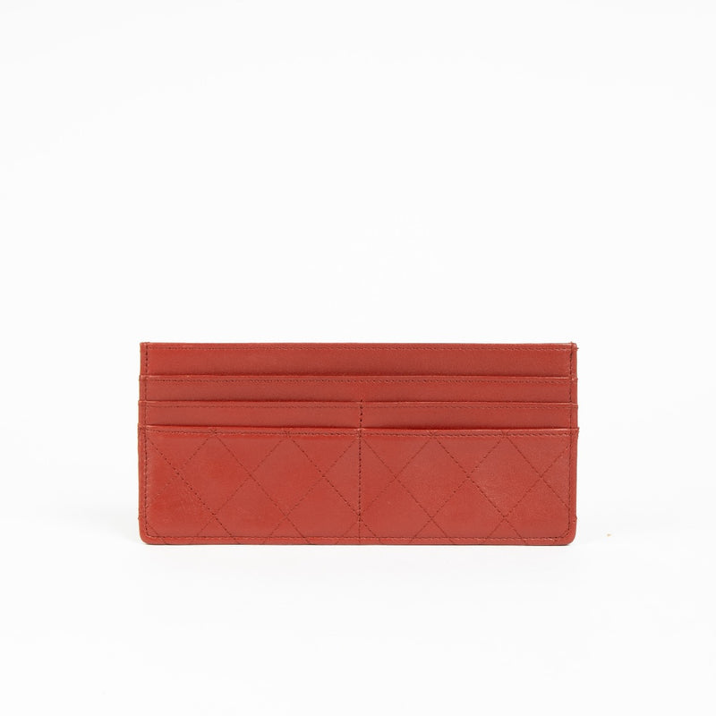 Authentic pre-loved Chanel Vintage Red Quilted Leather Card Holder on Labellov.com