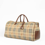 Authentic pre-loved Burberry Beige Haymarket Check Duffle Travel Bag on Labellov.com