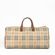 Authentic pre-loved Burberry Beige Haymarket Check Duffle Travel Bag on Labellov.com