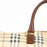 Authentic pre-loved Burberry Beige Haymarket Check Duffle Travel Bag on Labellov.com