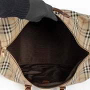 Authentic pre-loved Burberry Beige Haymarket Check Duffle Travel Bag on Labellov.com