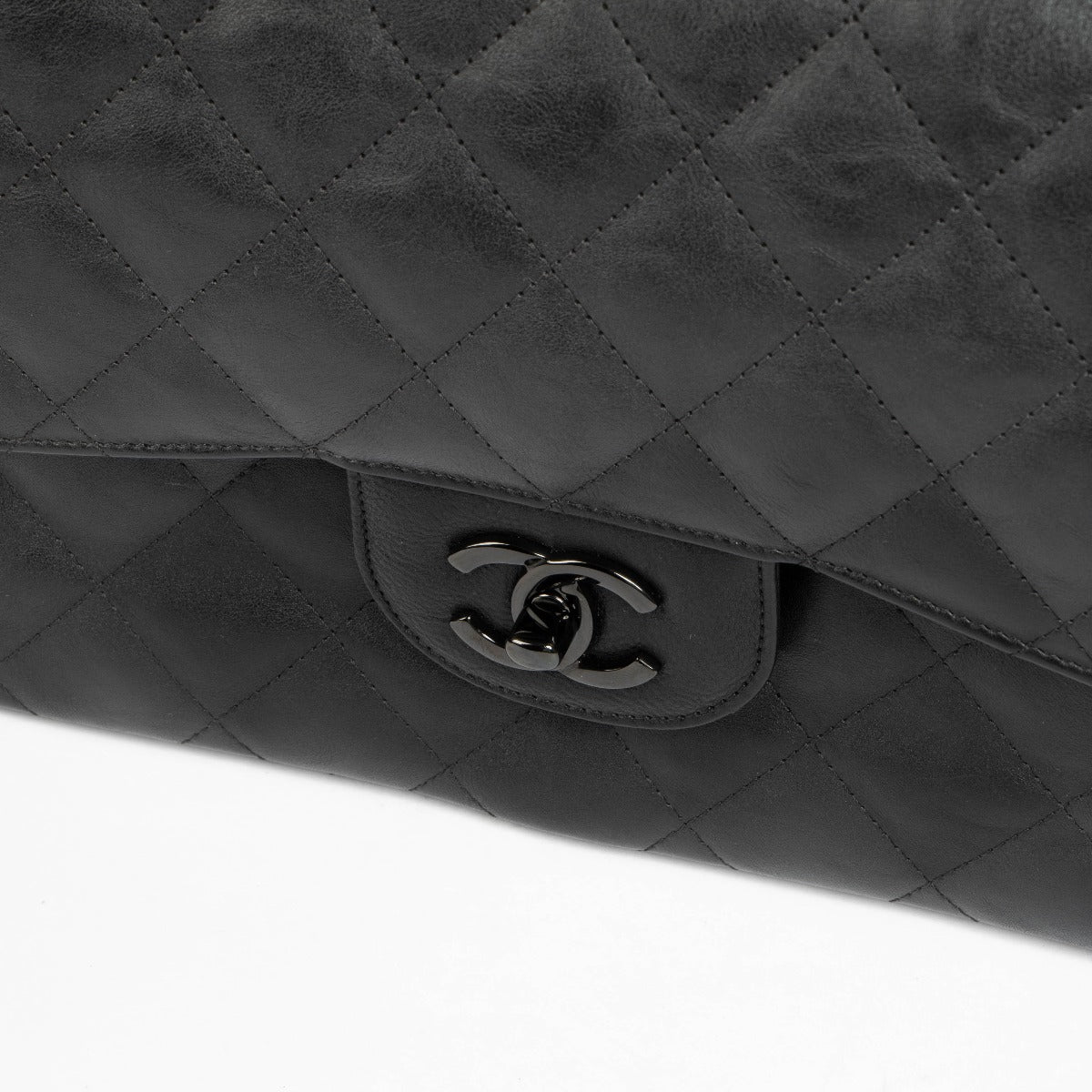 Shop this 100% authentic Chanel Black Crumpled Calfskin Large/Jumbo Classic Flap Bag at Labellov.com