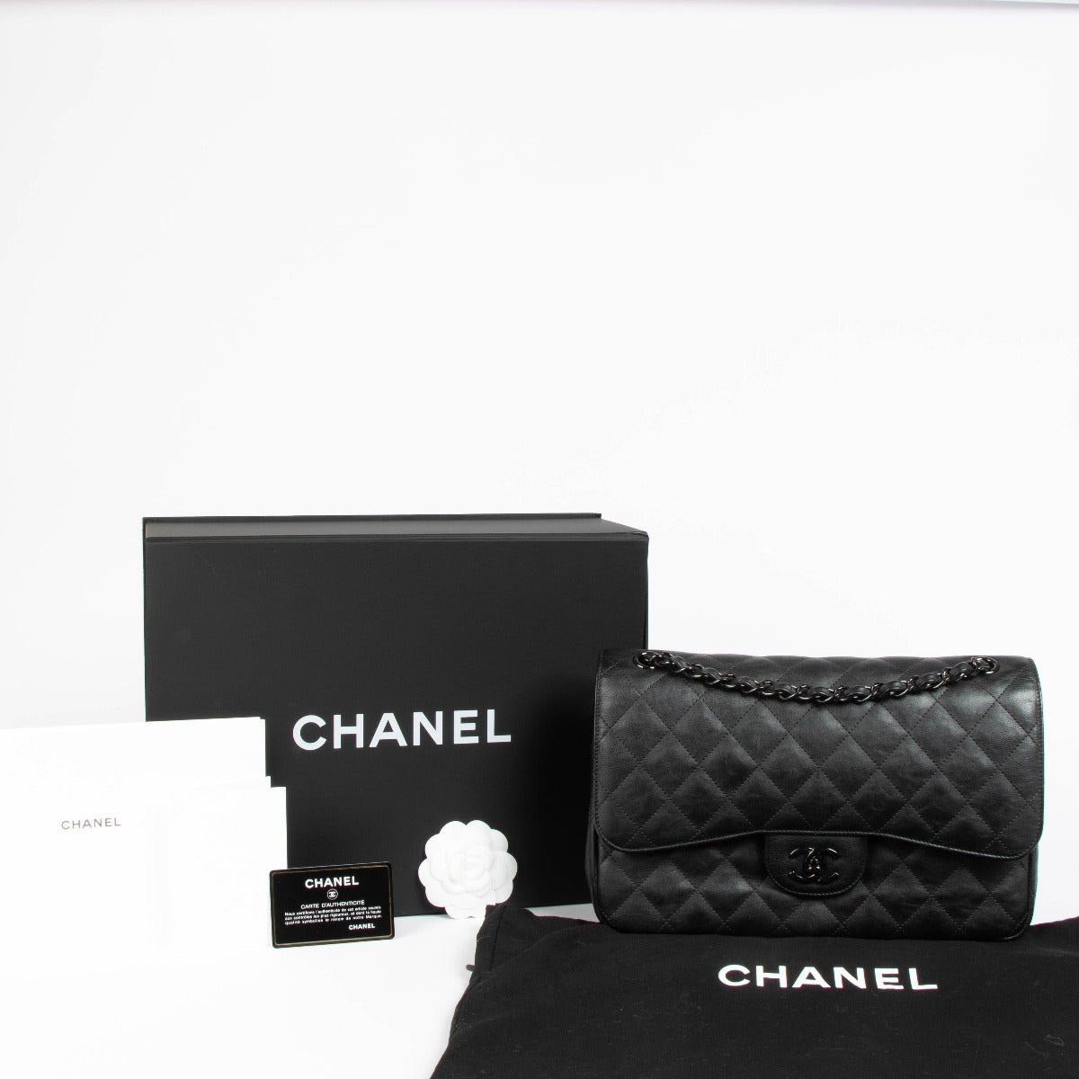 Shop this 100% authentic Chanel Black Crumpled Calfskin Large/Jumbo Classic Flap Bag at Labellov.com