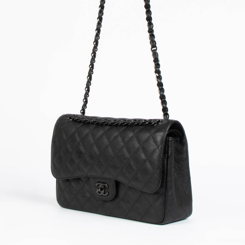 Shop this 100% authentic Chanel Black Crumpled Calfskin Large/Jumbo Classic Flap Bag at Labellov.com