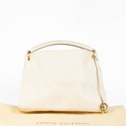 Authentic pre-loved Louis Vuitton White Monogram Empreinte Artsy MM Shoulder Bag on Labellov.com