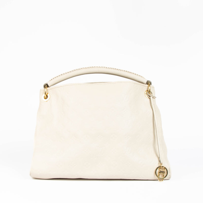 Authentic pre-loved Louis Vuitton White Monogram Empreinte Artsy MM Shoulder Bag on Labellov.com