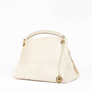 Authentic pre-loved Louis Vuitton White Monogram Empreinte Artsy MM Shoulder Bag on Labellov.com