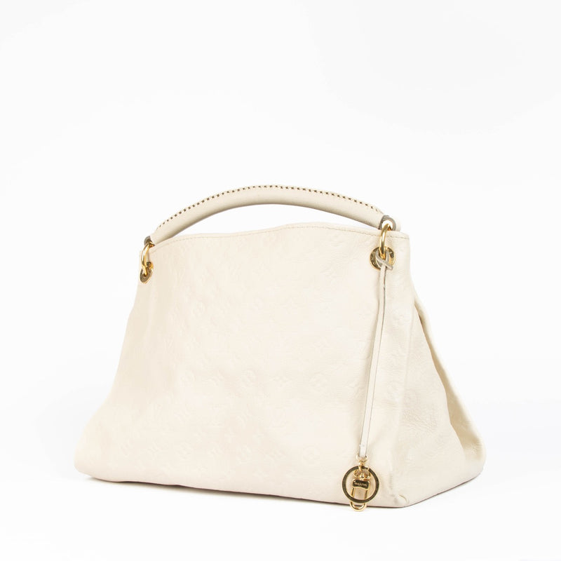 Authentic pre-loved Louis Vuitton White Monogram Empreinte Artsy MM Shoulder Bag on Labellov.com
