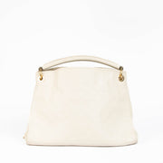 Authentic pre-loved Louis Vuitton White Monogram Empreinte Artsy MM Shoulder Bag on Labellov.com
