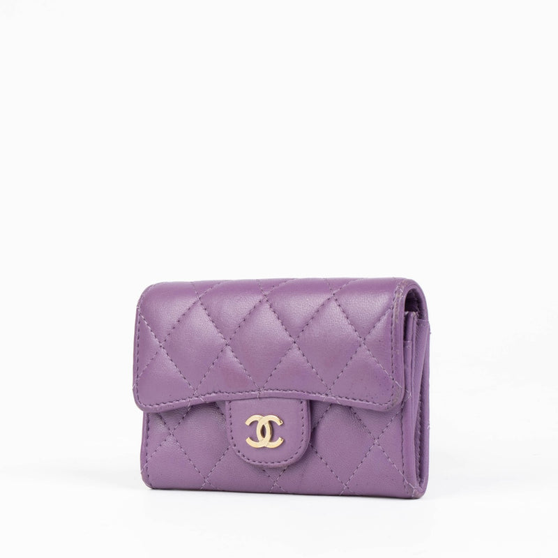 Authentic pre-loved Chanel Purple Quilted Lambskin Flap Card Holder on Labellov.com