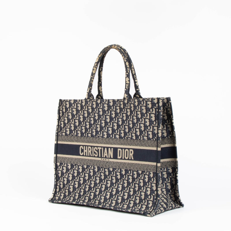 Authentic pre-loved Christian Dior Blue Oblique Large Book Top Handle Tote Bag on Labellov.com