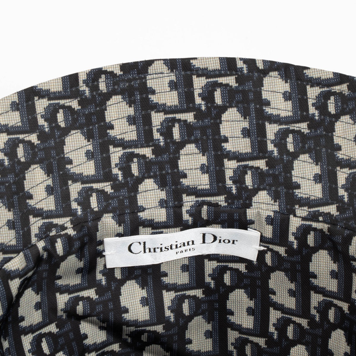 Authentic pre-loved Christian Dior Reversible Teddy D Bucket Hat on Labellov.com