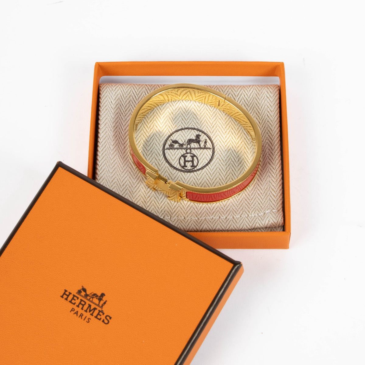 Authentic pre-loved Hermès Framboise Clic H Bracelet - Size GM on Labellov.com