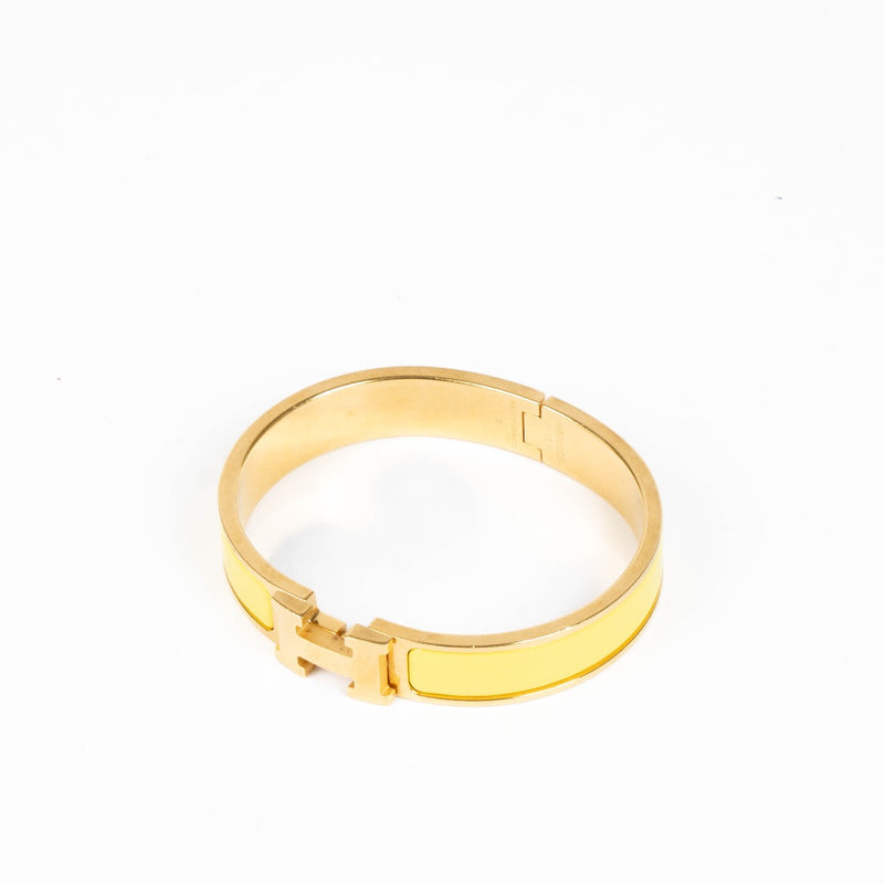 Authentic pre-loved Hermès Yellow Tennis Clic H Bracelet - Size GM on Labellov.com