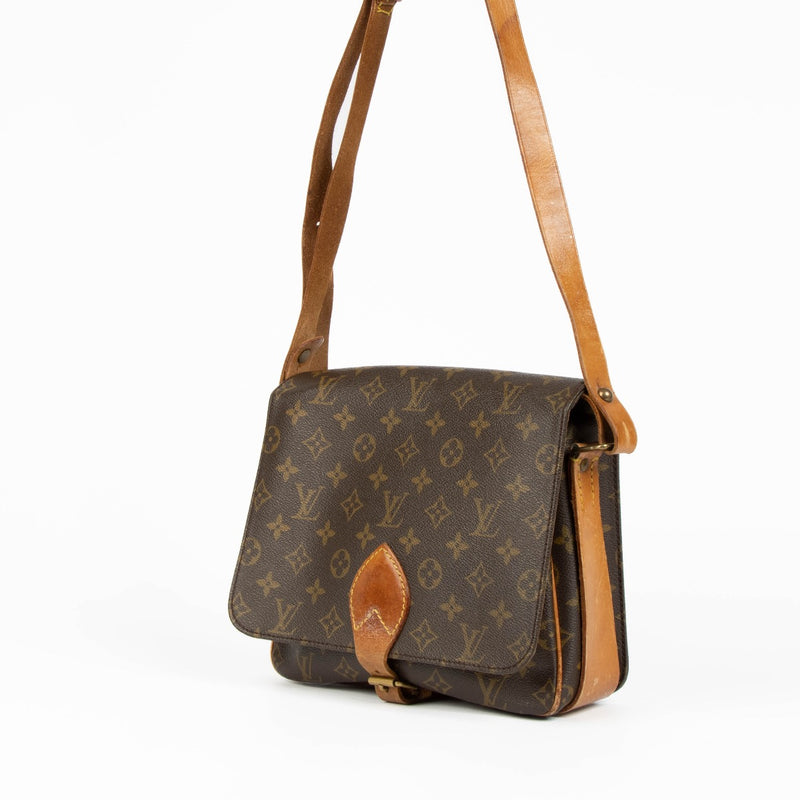 Authentic pre-loved Louis Vuitton Monogram Catourchiere MM Crossbody Bag on Labellov.com