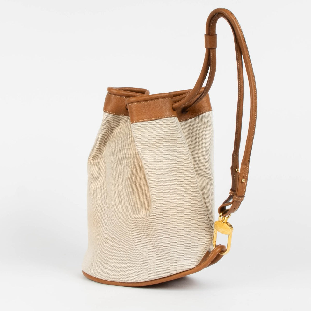 Shop this 100% authentic Delvaux Beige Canvas Pierre de Lune Bucket Bag at Labellov.com