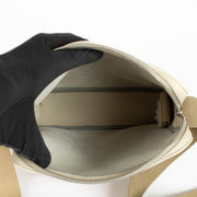 Shop this authentic Delvaux Cream Leather Crossbody Bag With Textile Strap pre-loved on Labellov. com