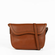 Shop this authentic Delvaux Tan Crossbody Flap Bag pre-loved on Labellov.com