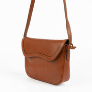 Shop this authentic Delvaux Tan Crossbody Flap Bag pre-loved on Labellov.com