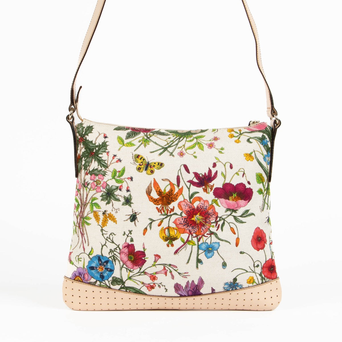 Shop this authentic Gucci Flora Canvas Perforated Messenger Bag pre-loved on Labellov.com