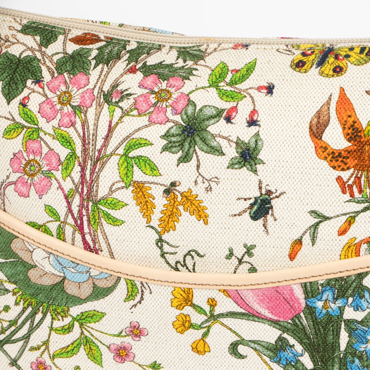 Shop this authentic Gucci Flora Canvas Perforated Messenger Bag pre-loved on Labellov.com