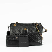 Authentic pre-loved Chanel Black Vintage With Wallet Shoulder Bag on Labellov.com