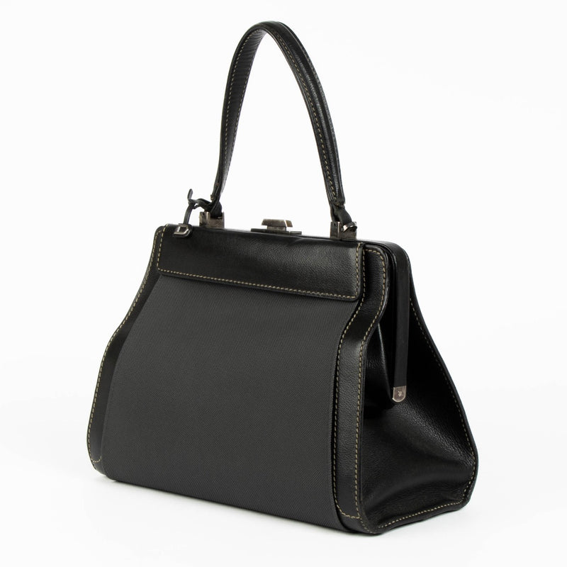 Authentic pre-loved Delvaux Black Illusion Jumping Top Handle Bag on Labellov.com