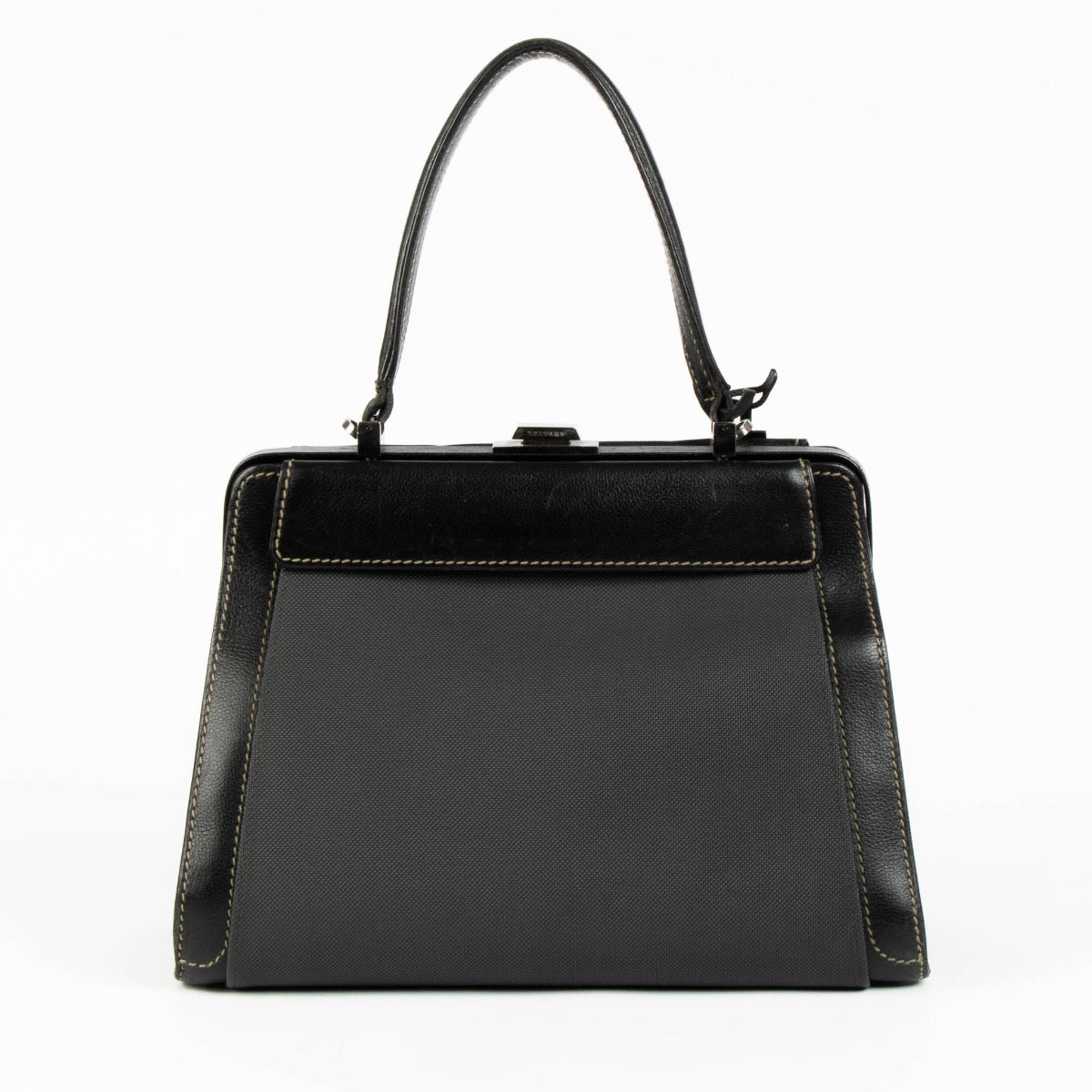 Authentic pre-loved Delvaux Black Illusion Jumping Top Handle Bag on Labellov.com