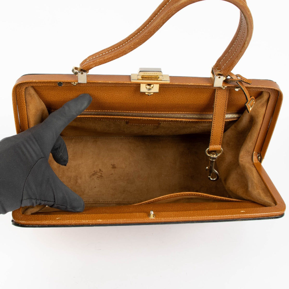 Authentic pre-loved Delvaux Cognac Leather Classicp Top Handle Bag on Labellov.com