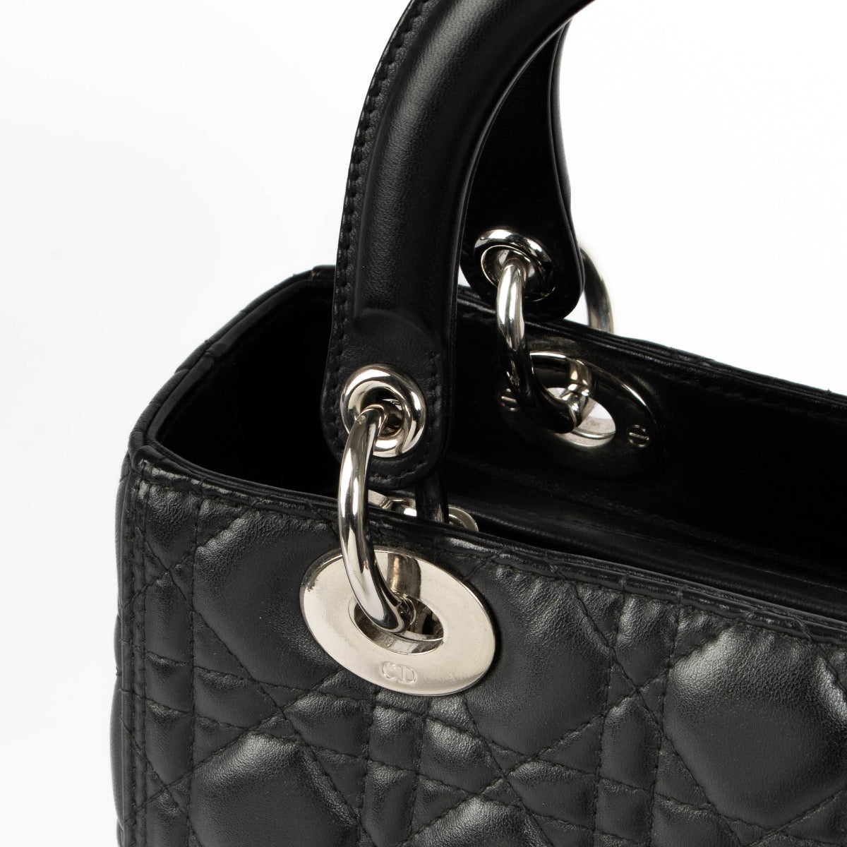 Authentic pre-loved Christian Dior Black Medium Lady Dior Top Handle Bag on Labellov.com