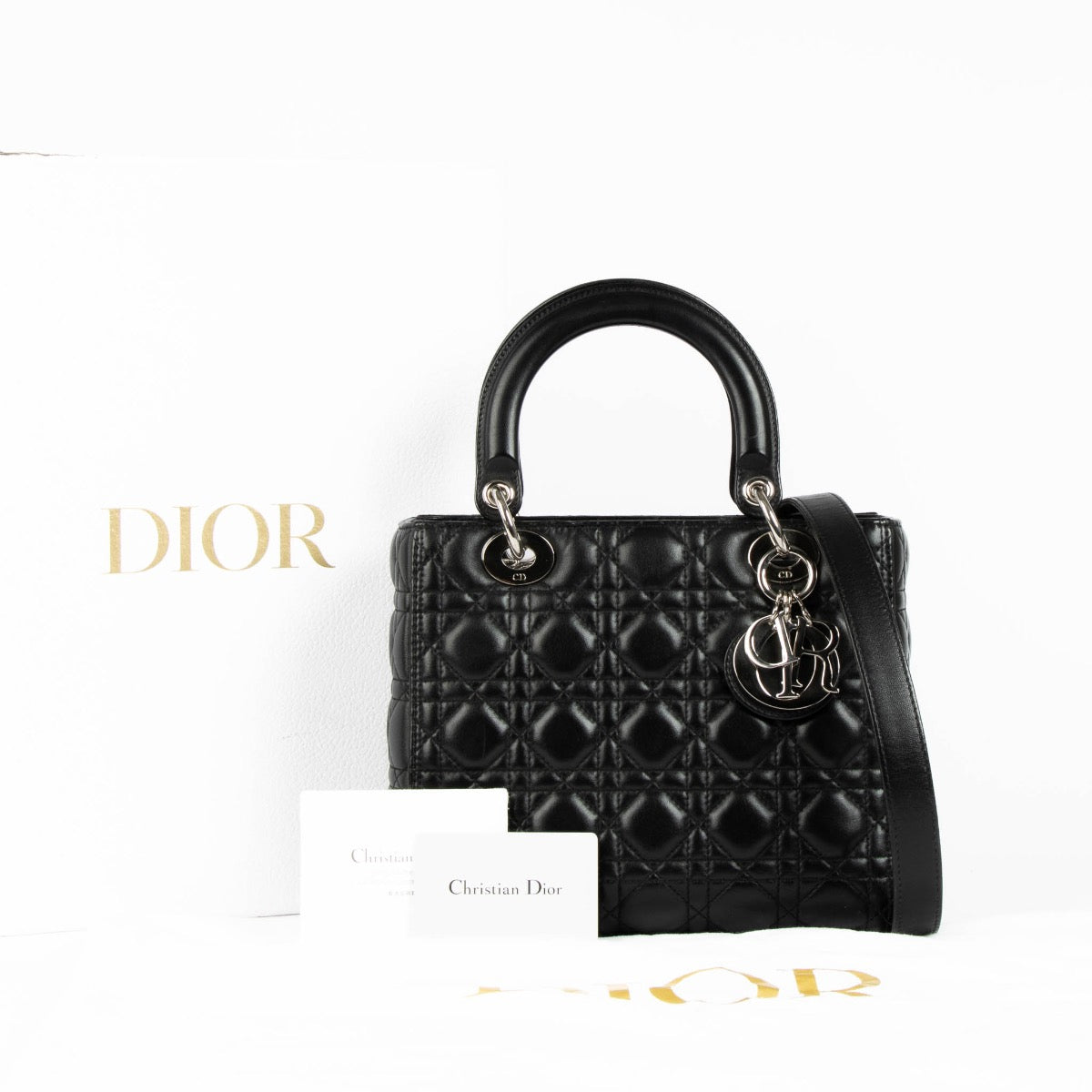 Authentic pre-loved Christian Dior Black Medium Lady Dior Top Handle Bag on Labellov.com